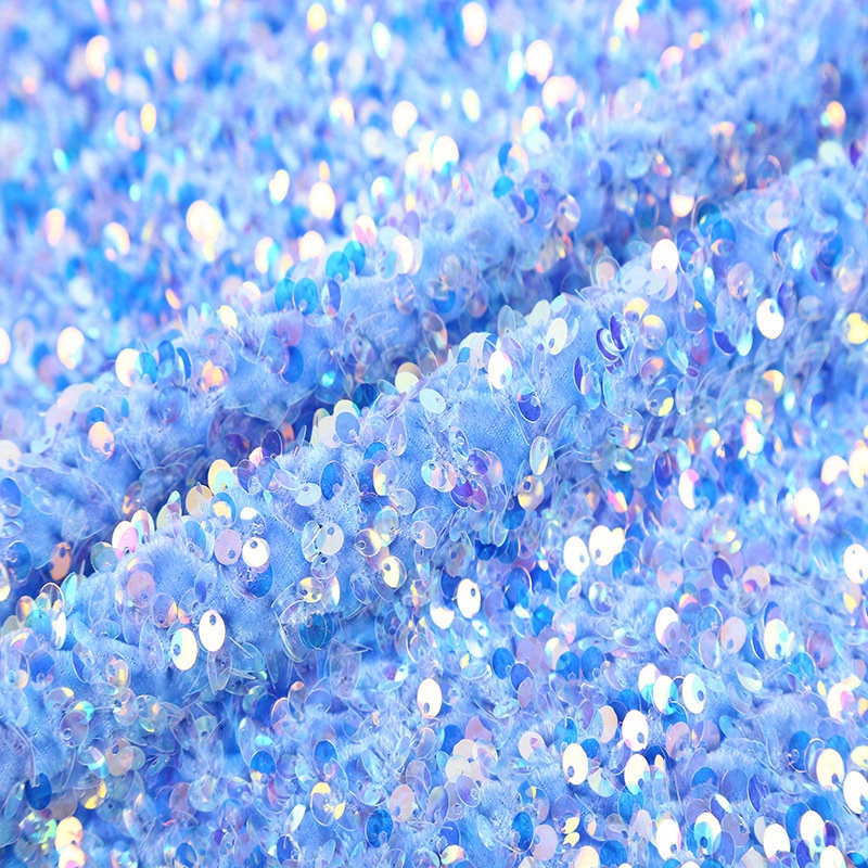 Fabric with shiny blue sequins  free image by rawpixel.com