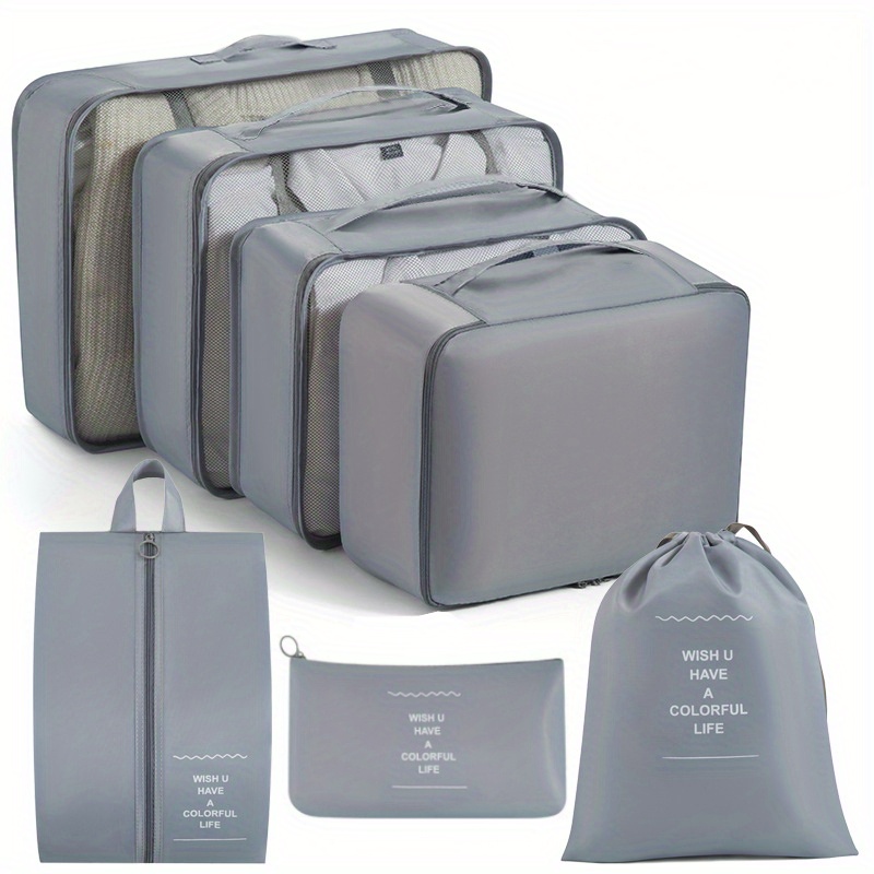 Jsdoin Cubi da imballaggio per valigia, 9 pezzi, organizer da viaggio per  zaino, borsa essenziale da viaggio impermeabile, accessori da viaggio  (grigio) : : Moda