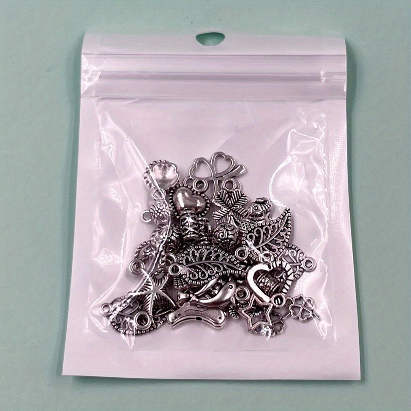 Bulk Lot of 100 Silver Color Charms: Perfect for DIY Jewelry Making and  Crafting