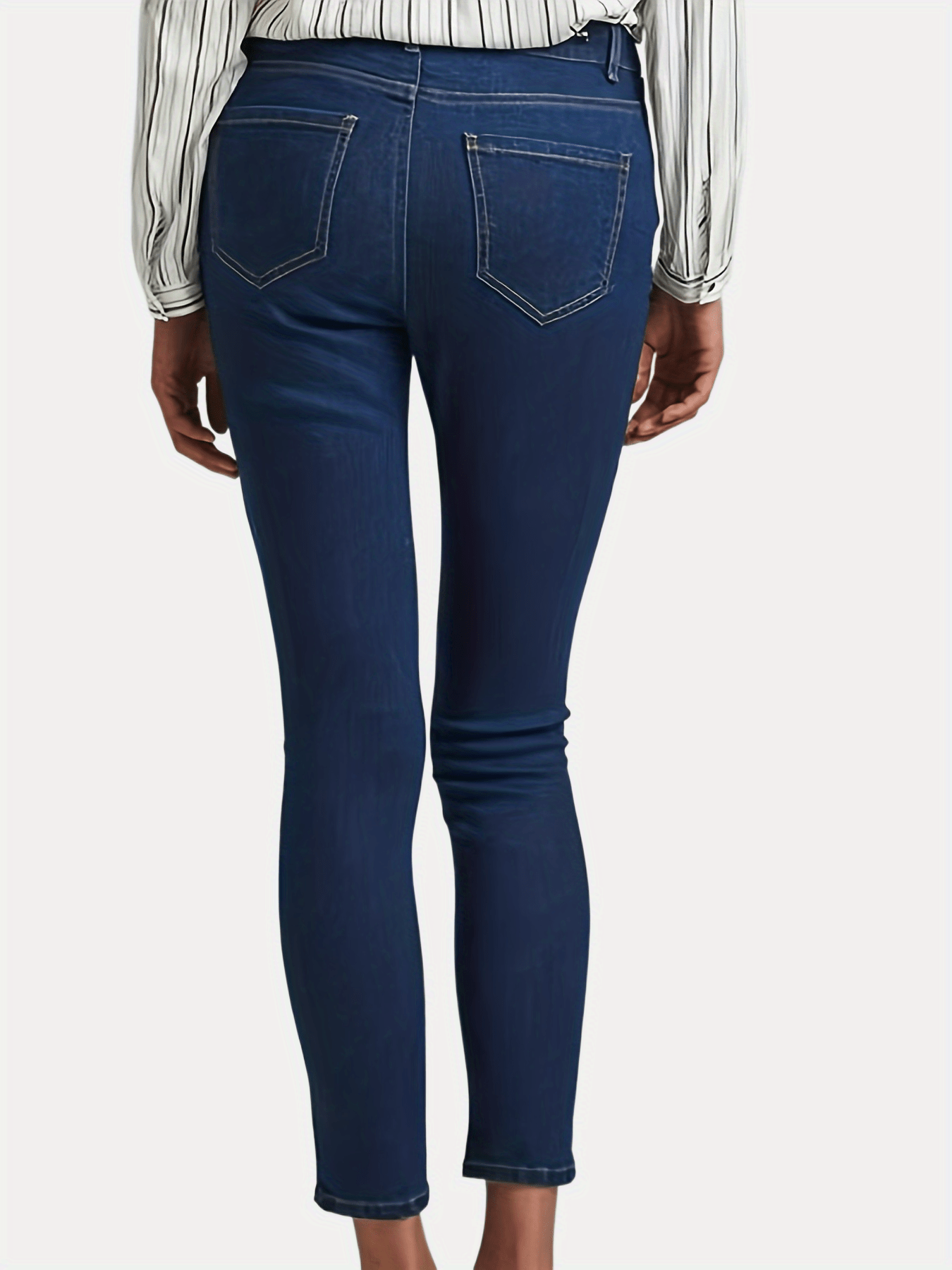  Jeans ajustados de cintura alta con cinturón (color