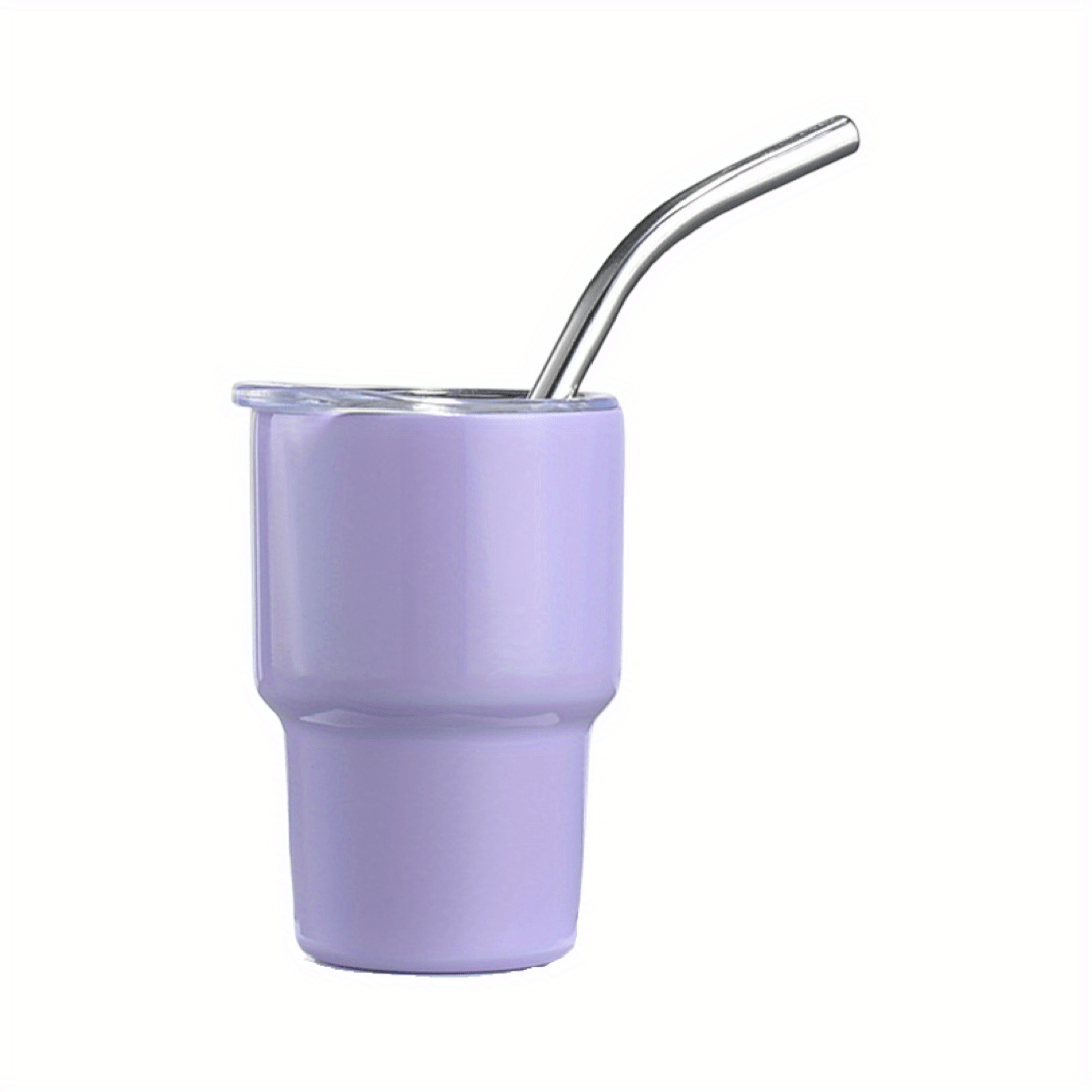 Violet glass cup with lid and straw on a white background isolated