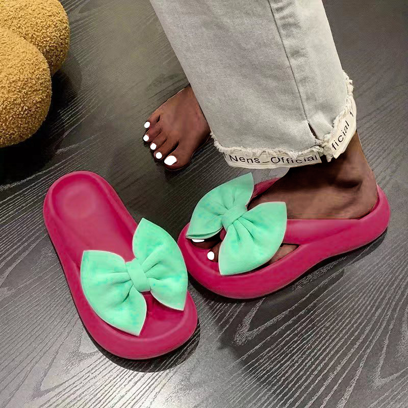 Pink bow best sale flip flops