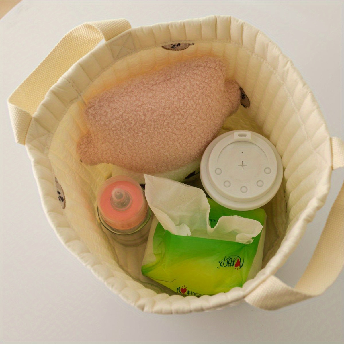 organize your babys room with this stylish embroidered cotton storage basket details 4