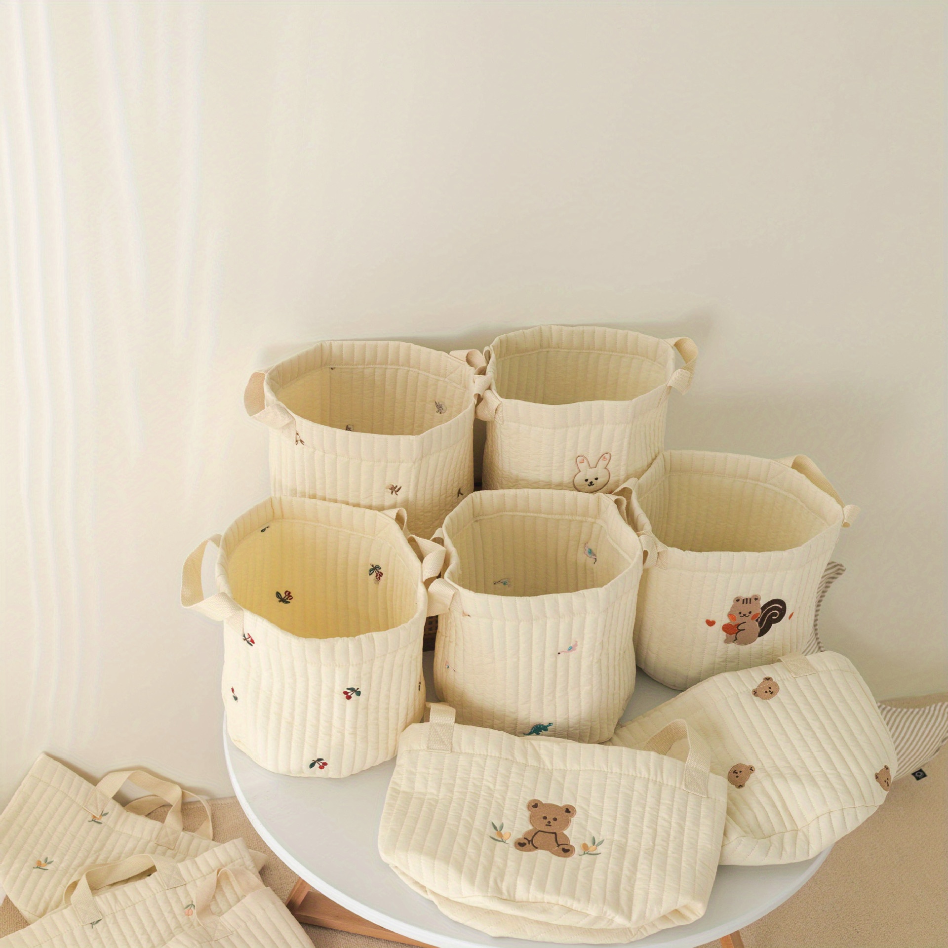 organize your babys room with this stylish embroidered cotton storage basket details 2