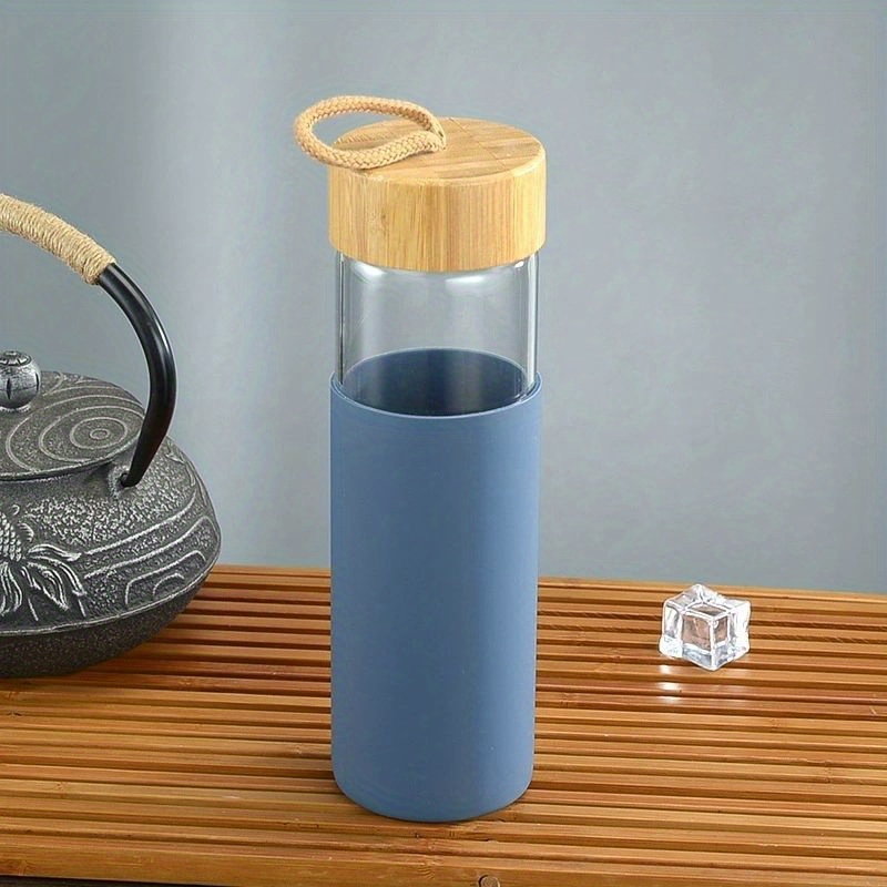 YEBODA Botellas de agua de vidrio de 18 onzas para bebidas y exprimidores,  tapas de acero inoxidable, incluye funda de protección de nailon colorida