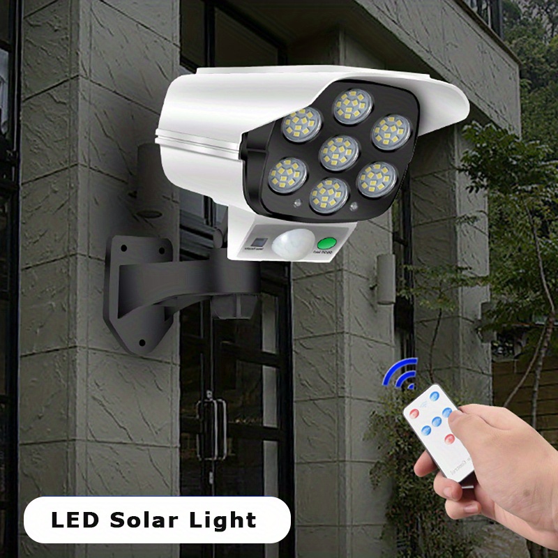 Luces solares con sensor de movimiento para exteriores, cámara de seguridad  falsa, 800 lúmenes, 8 focos LED de 5 vatios, luces solares para exteriores