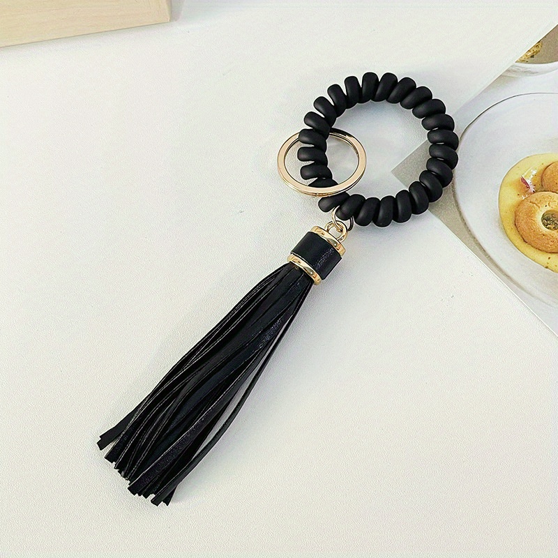 Black logo band key ring