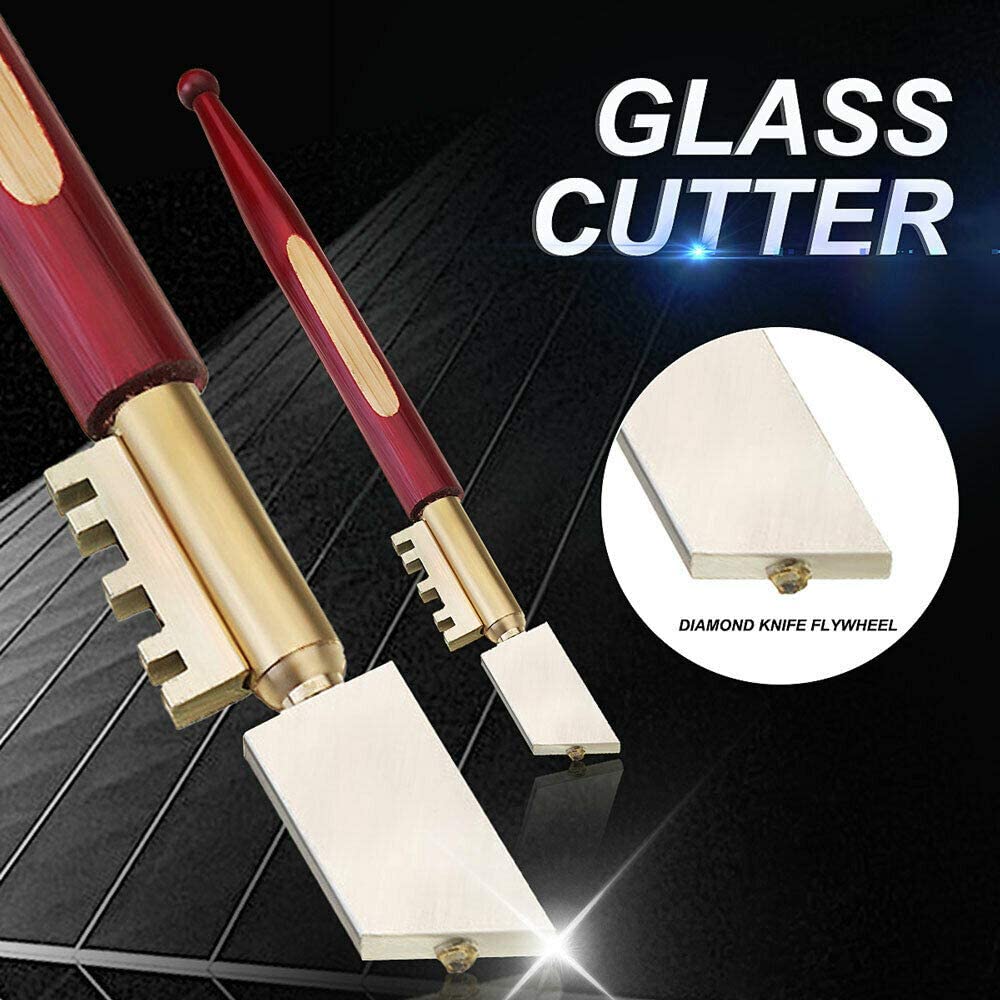 Glass cutting by hand ..A glass cutter tool with diamond blade used to make  a shallow