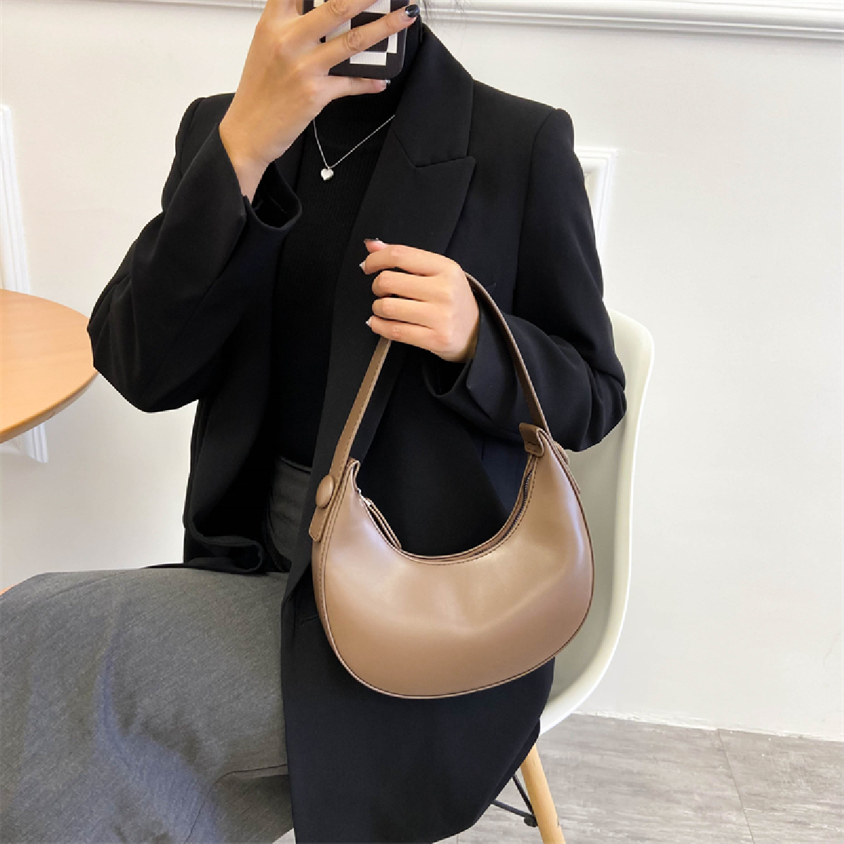 The Row, Half Moon brown leather shoulder bag