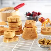 us plug mini waffle cooking machine produce 7 different shapes of pancakes including a cat dog reindeer etc electric non stick waffle iron pan cake pot roaster for children and adults to make fun brea details 0