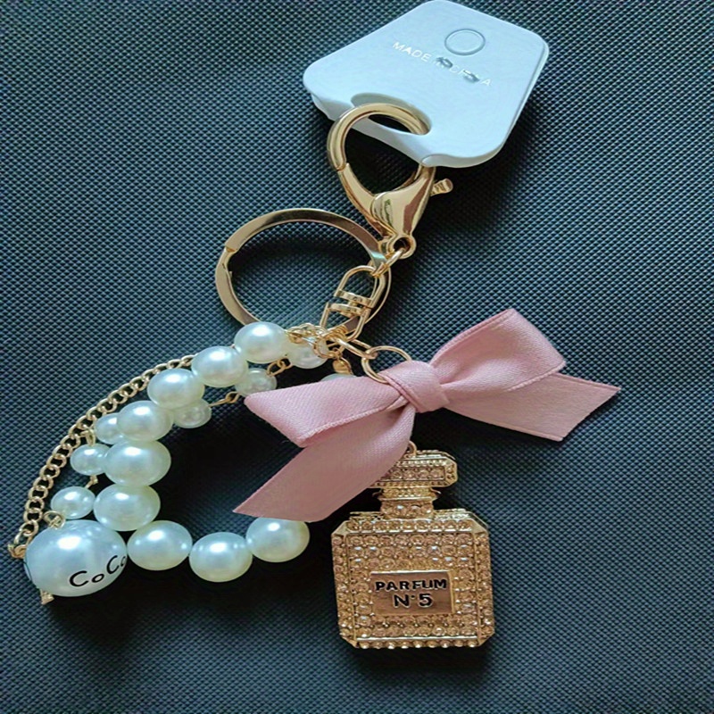 SKAIJEWEL Perfume Bottle Rhinestone Keychain Bow-Knot Pearl Cute Handbag  Key Chain Personalized Key ring Golden for Women Girls Car Creative Gift  White, Small at  Women's Clothing store