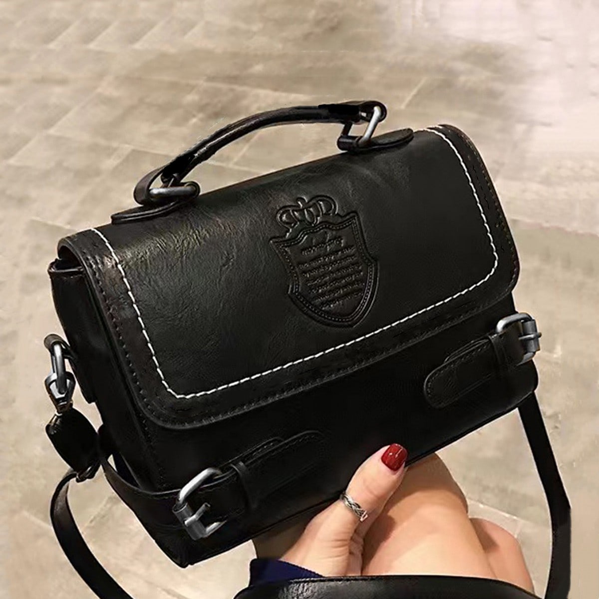 Double buckle satchel on sale bag