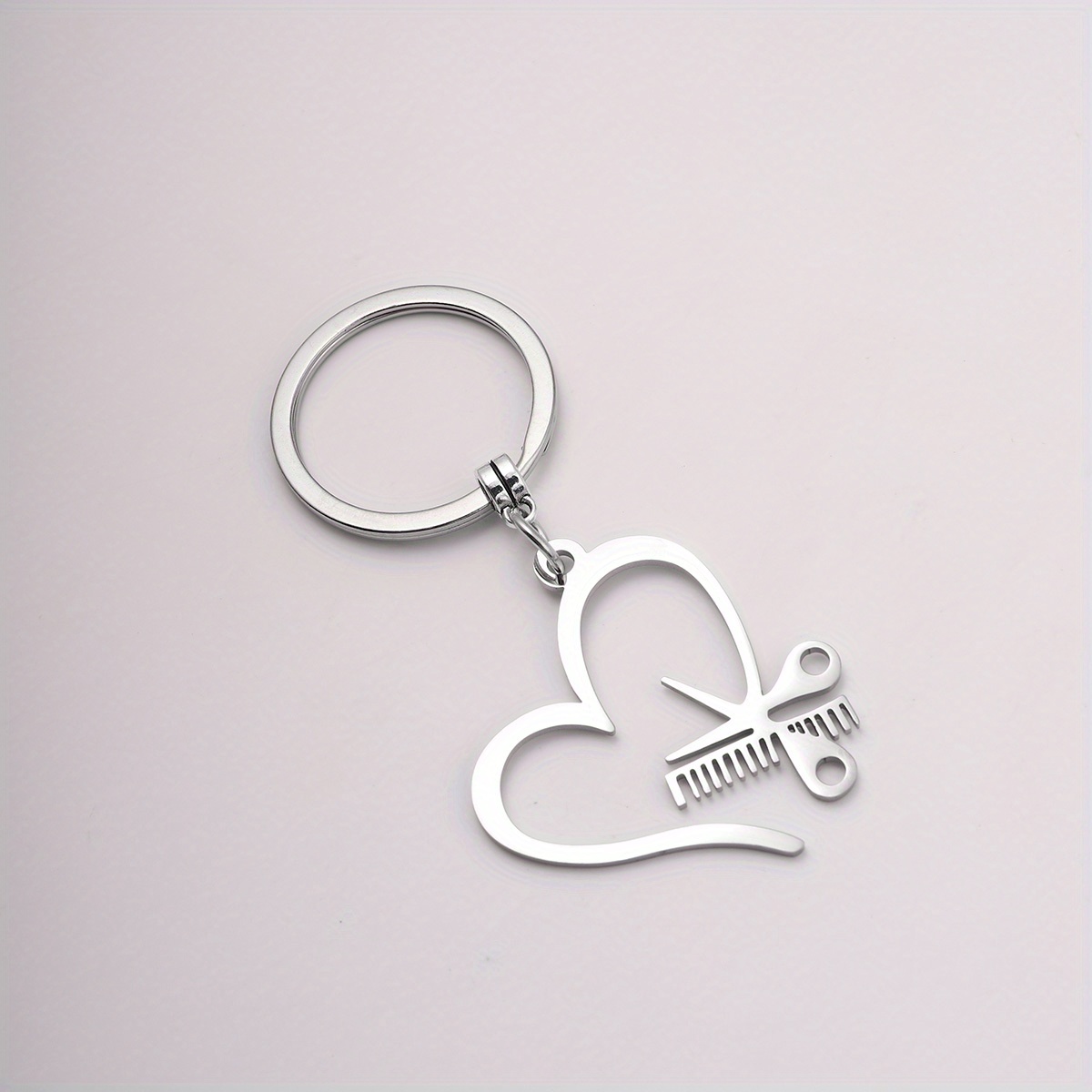 A Stainless -shaped Scissor Comb Keychain