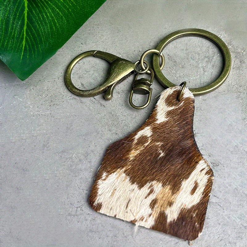 LOUISVUITTON cow shape keychain