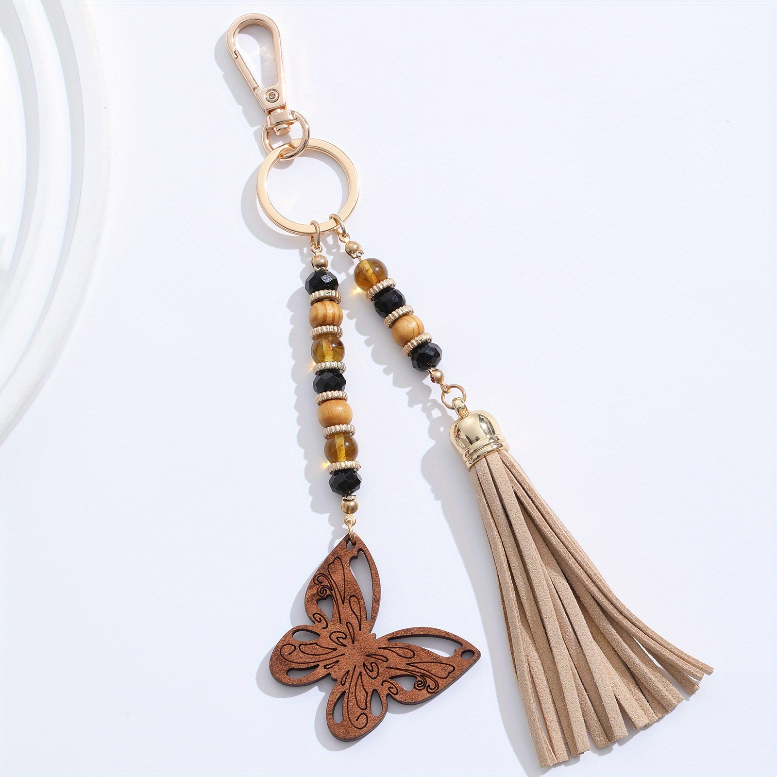 Image of European And New Retro Handmade Beaded Matching Microfiber Tassel Wood Carving Rainbow Sun Owl Mushroom Keychain