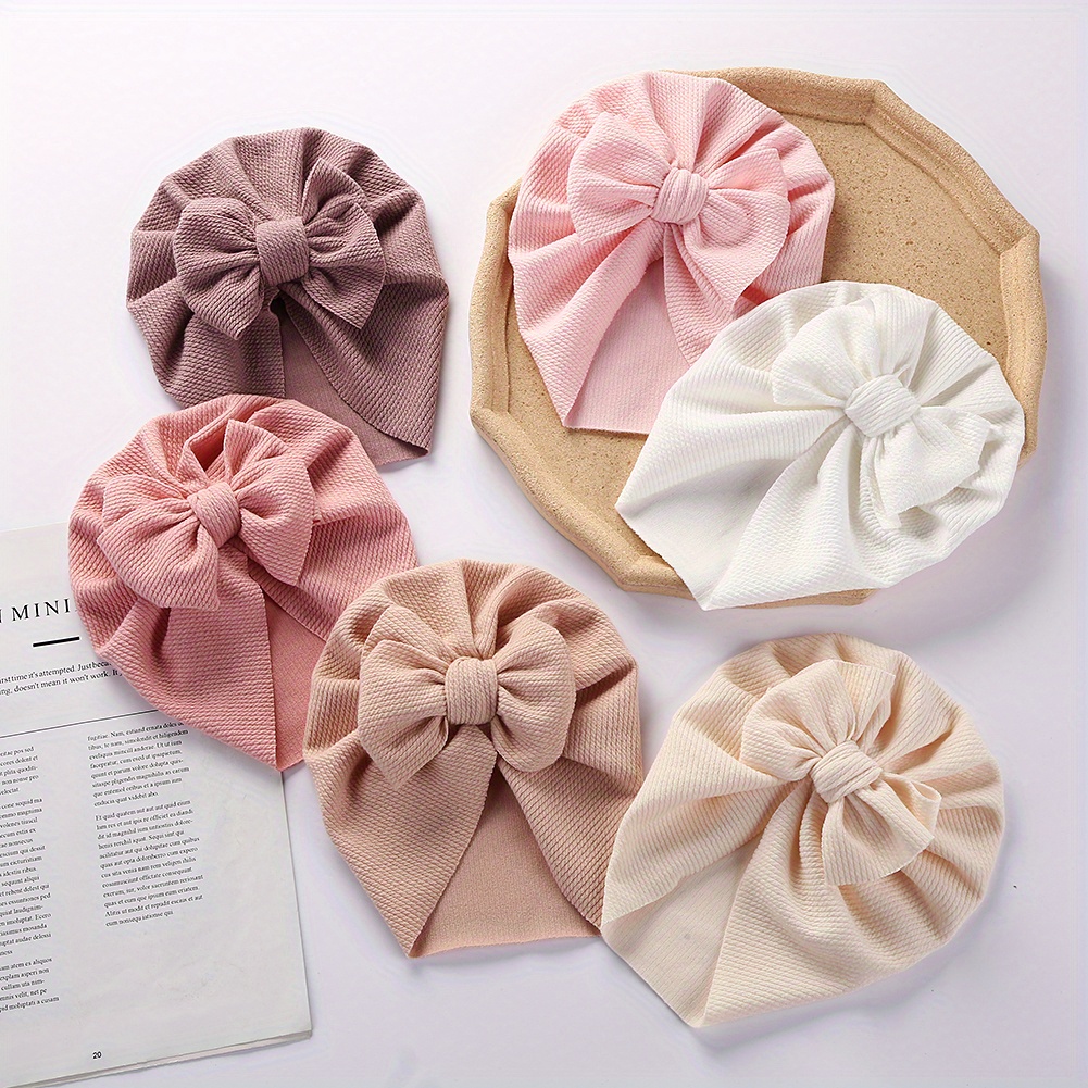 1pc Baby Girls' Stretchy Bow Detail Beanie Hat - Soft Breathable Knit Adjustable Snug Fit for Toddlers, Pastel Pink & Beige, Spring/Fall Casual & New Year Occasions, Toddler Hat, Spring Toddler Wear, Autumn Toddler Accessory, Minimalist Toddler Style, Comfortable Babywear, Infant Headwear, Lightweight Material, Infant Cap, Kids Fashion