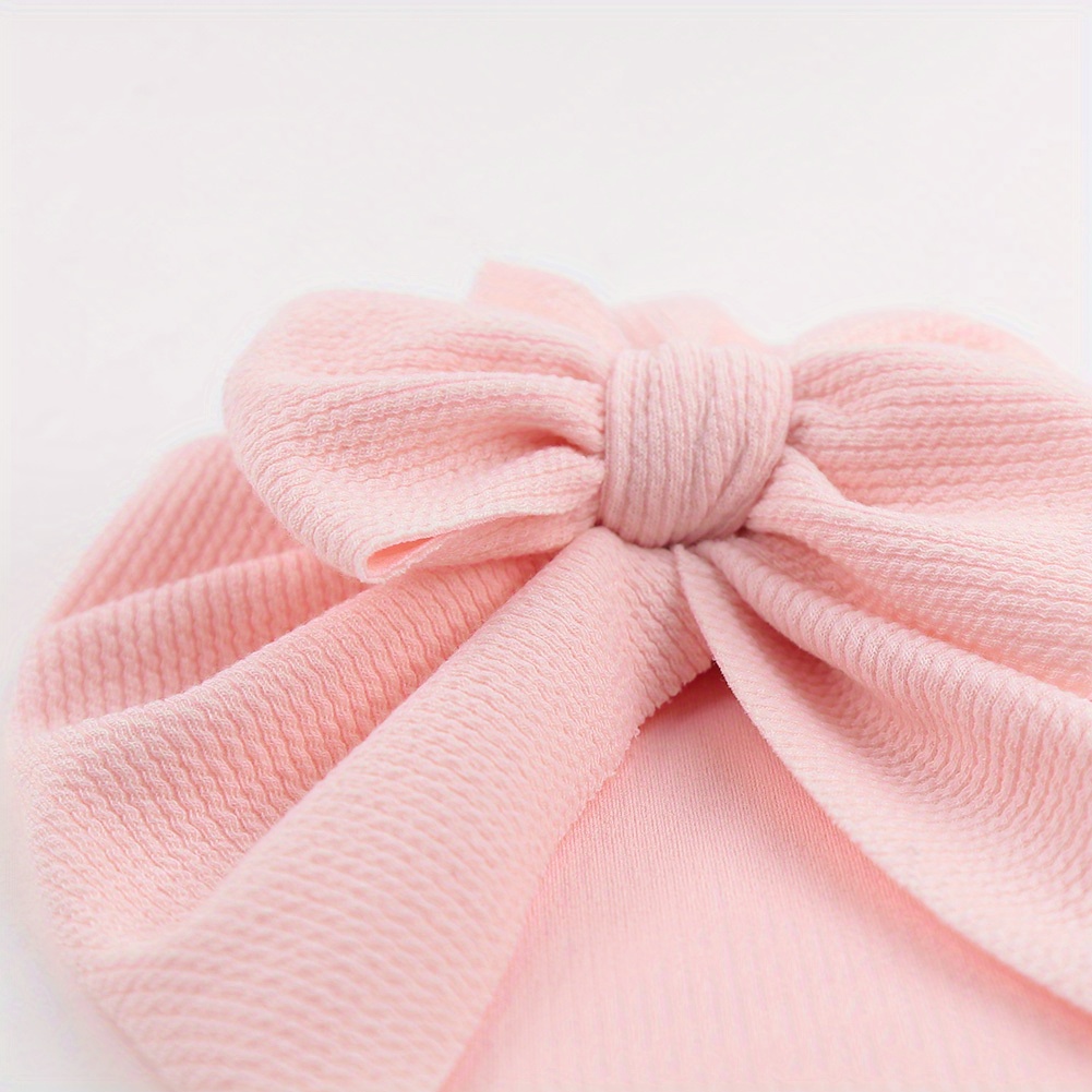 1pc Baby Girls' Stretchy Bow Detail Beanie Hat - Soft Breathable Knit Adjustable Snug Fit for Toddlers, Pastel Pink & Beige, Spring/Fall Casual & New Year Occasions, Toddler Hat, Spring Toddler Wear, Autumn Toddler Accessory, Minimalist Toddler Style, Comfortable Babywear, Infant Headwear, Lightweight Material, Infant Cap, Kids Fashion