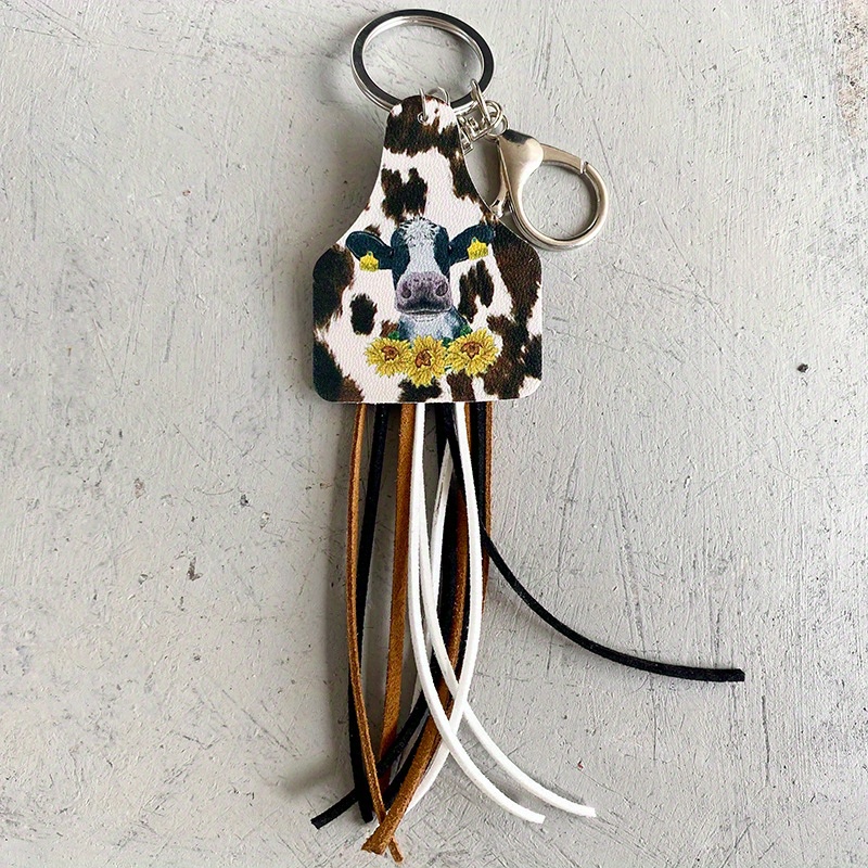 RHINESTONE COW SKULL KEYCHAIN WITH TASSEL