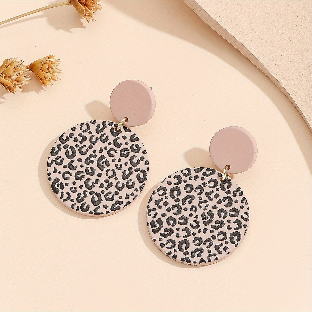 A Pair Of Colorful Round Acrylic Pendant Earrings Featuring A Camouflage Leopard Print, Perfect For A Festive Party And Stylish For