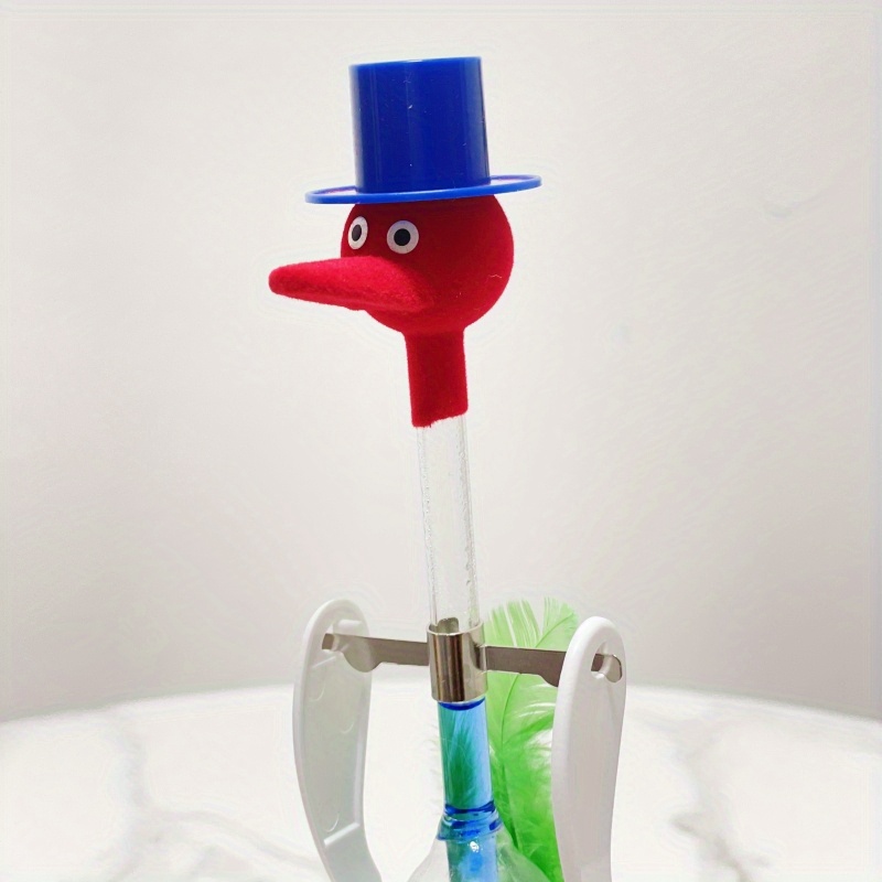 Discover the Fascinating Science Behind the Timeless Drinking Bird Toy 