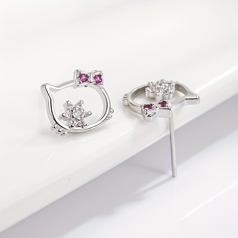 4 bagues Hello Kitty et 8 boucles d'oreilles pour enfant