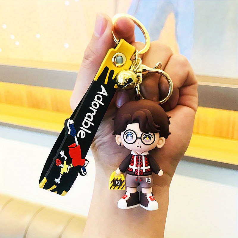 A set of men and women brown key chain pendant silicone cartoon