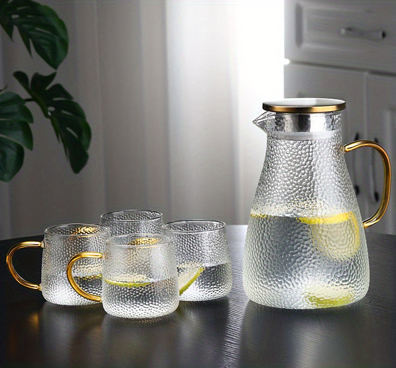 large capacity elegant glass pitcher with golden handle   heat resistant carafe for cold beverages tea water dishwasher safe textured design for   use details 4