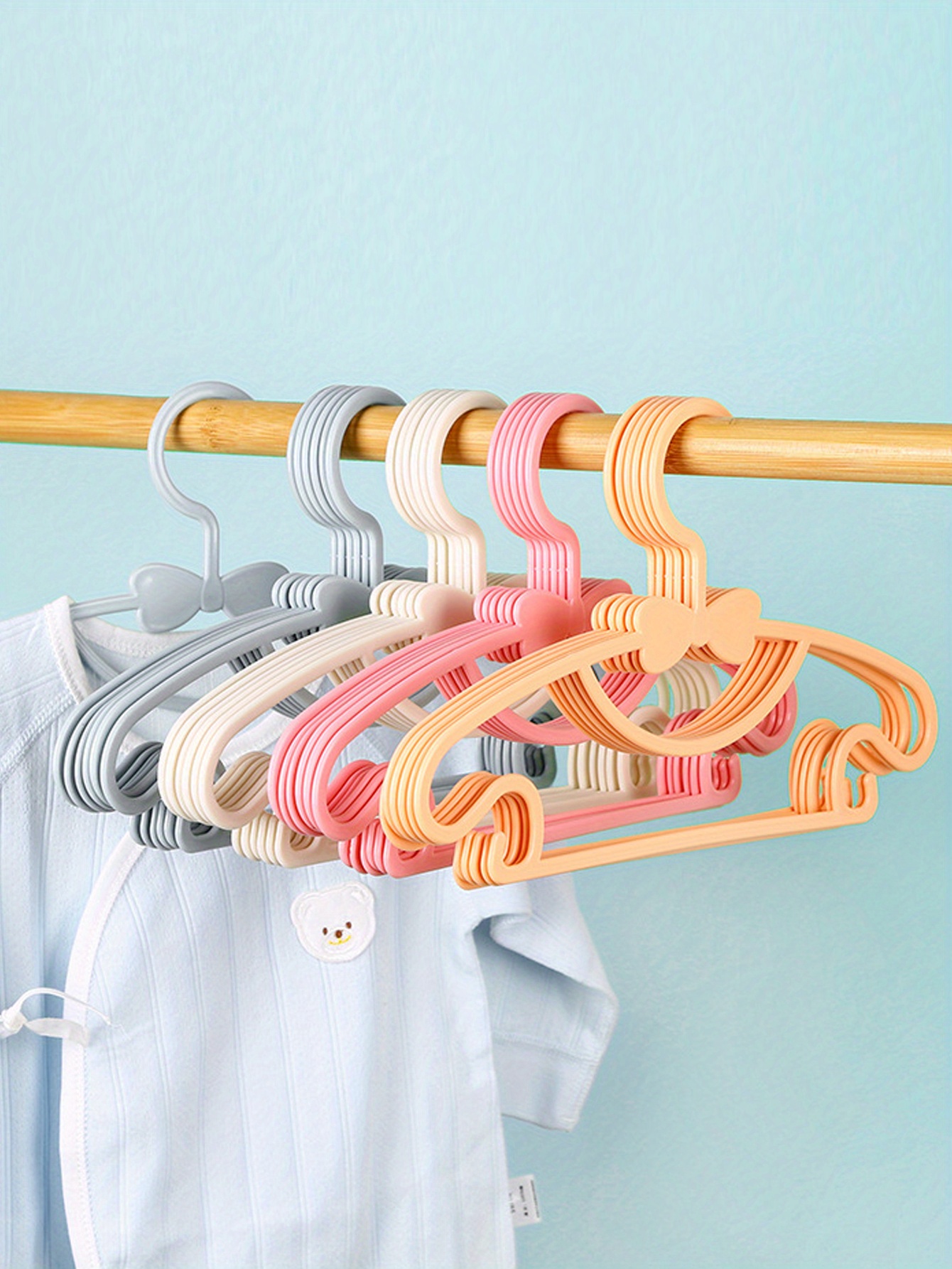 Portable Kids Clothes Hanger Plastic Household Baby Coat Rack Thickened Bow  Coat Hanger Clothing Organizer - Temu