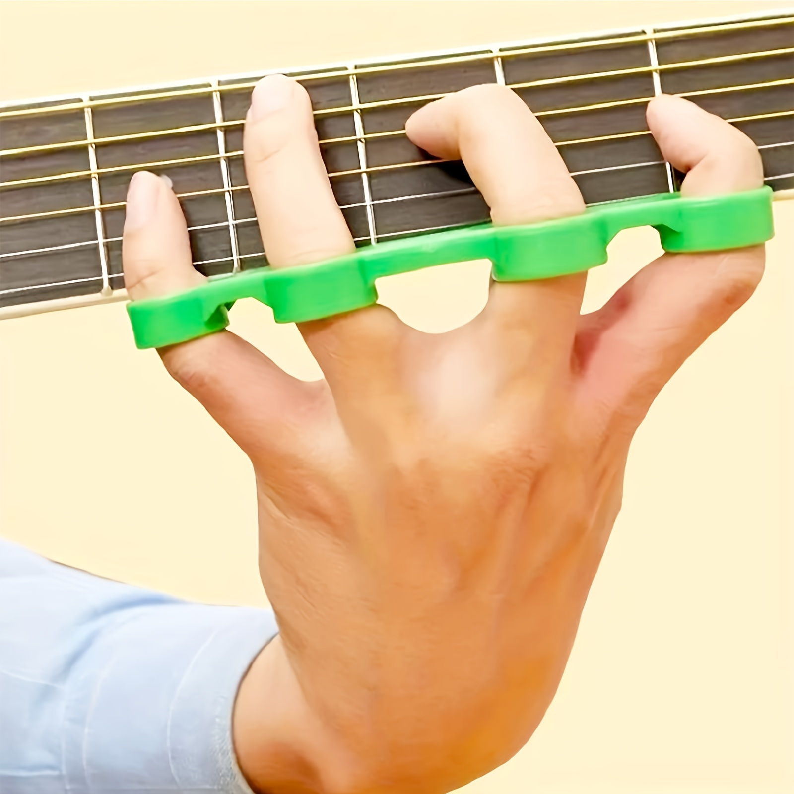 

Guitarist Stretches Fingers With Exercise Device Finger Span Expander Finger And Chord Exercise Trainer