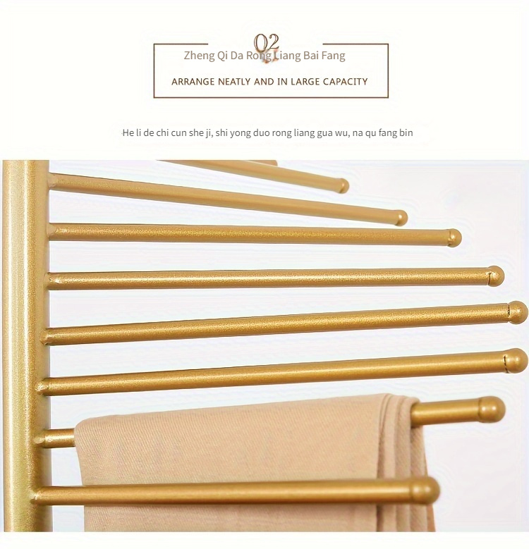 elegant golden metal scarf towel rack freestanding rotating display stand for shawls ties belts with fringe detail ideal for clothing stores   details 1