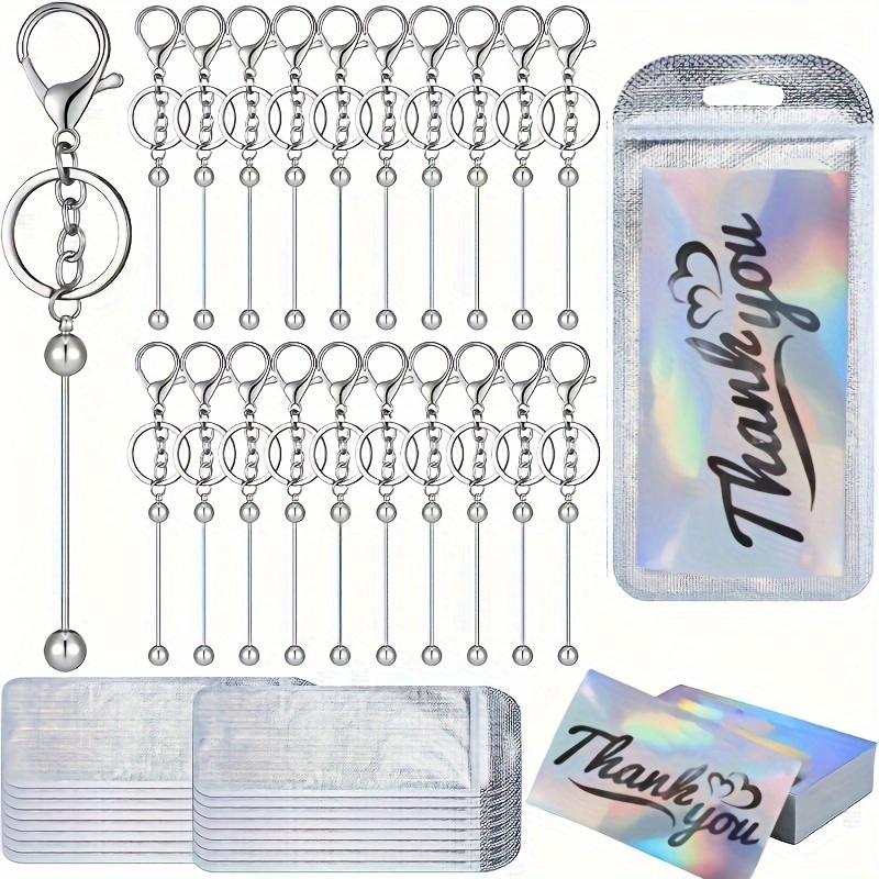 

20pcs Nouveau Porte-clés à Perles DIY Porte-clés à Perles Mignon Pendentif Ornement Set (5pcs Barre de Porte-clés à Perles +5pcs Porte-clés +5pcs Sac +5pcs Carte)