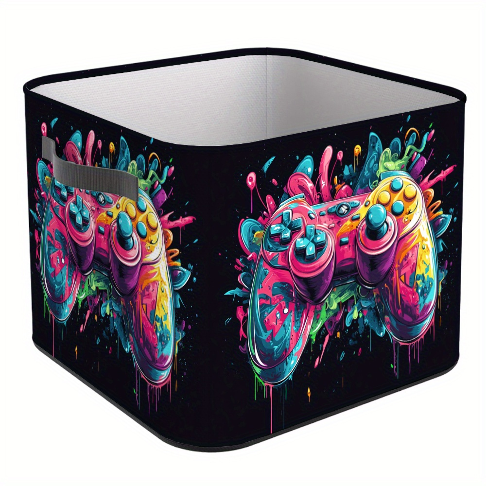 E-shop Ein zusammenklappbarer Aufbewahrungskorb mit Spielgriffen und einem Spritzmuster-Design. Diese offene Aufbewahrungsbox ist ein