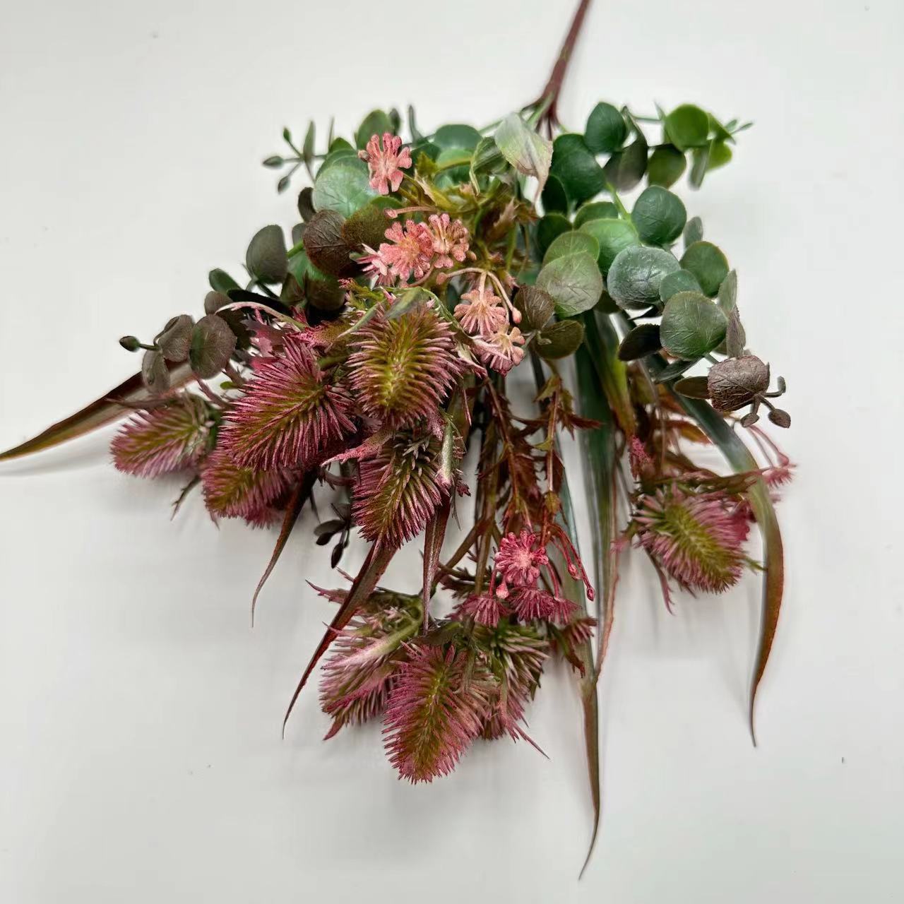 Image of A Bouquet Of Artificial Flowers, Featuring Faux Celery Flowers In A Vintage Autumn Color Scheme