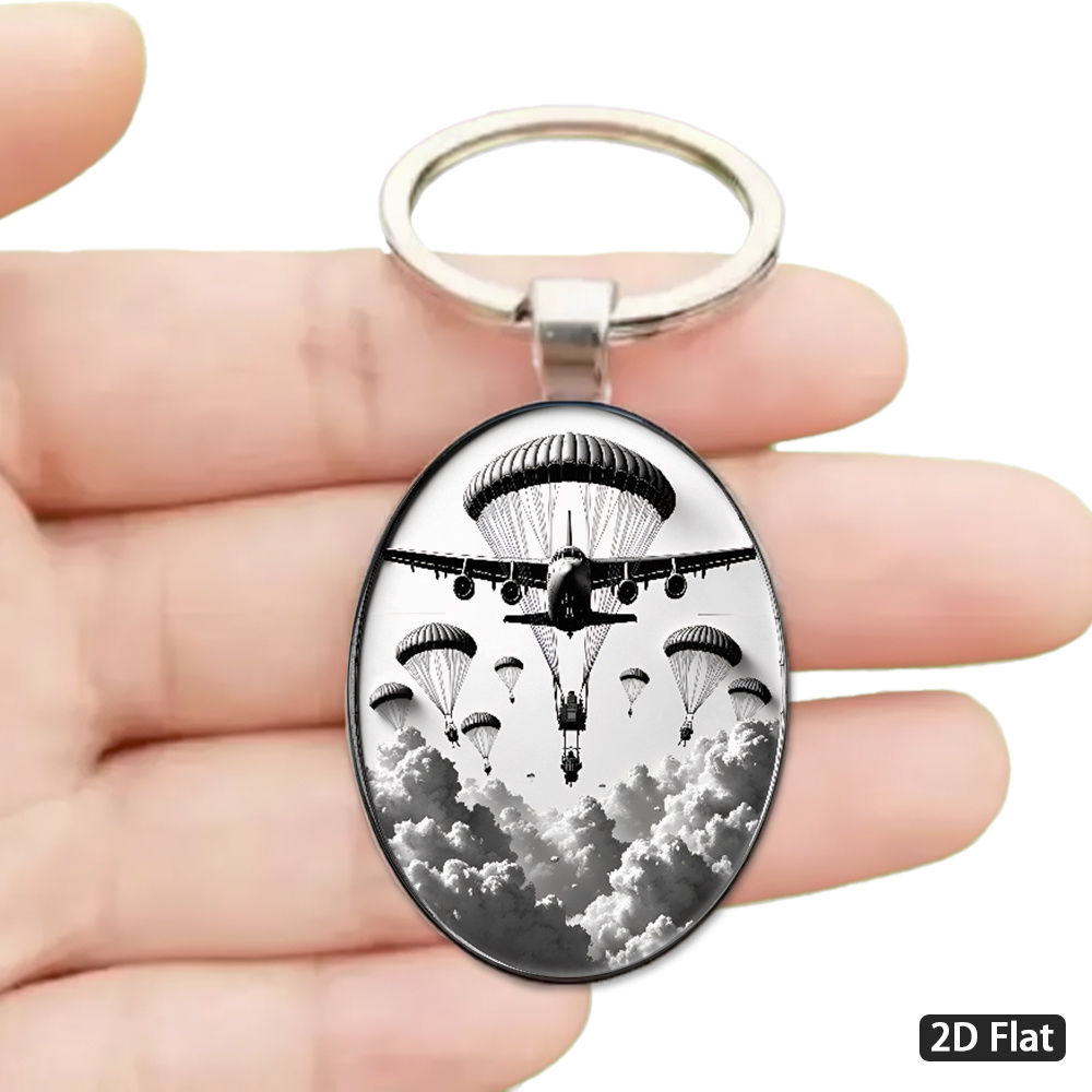TEMU 2d Flat - 1pc 2d Flat, Military-style Parachute Theme Keychain, Black And White Illustration Design, Multi-parachute Continuous Dynamic Sense,
