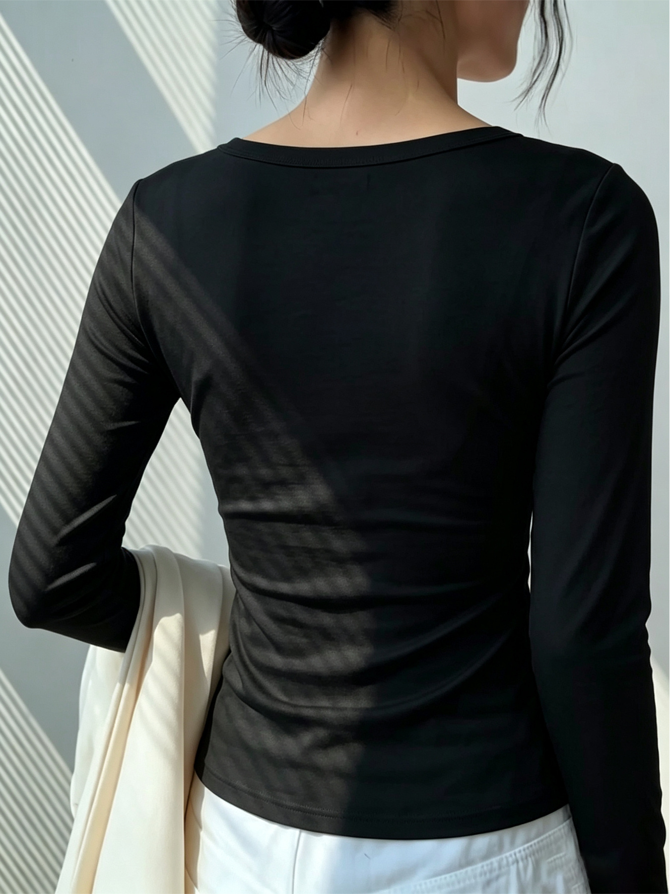 womens long sleeve button waist blouse with a unique half open neckline waist cinching design and a dynamic   geometric   letter print a stretchy   fit pullover top suitable for multiple occasions dating