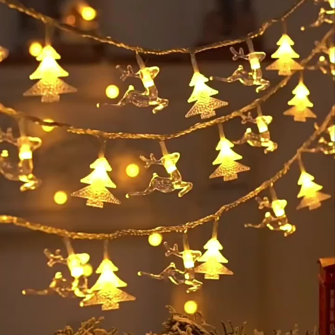 Maison de Noël décorative avec guirlandes lumineuses - Mirto