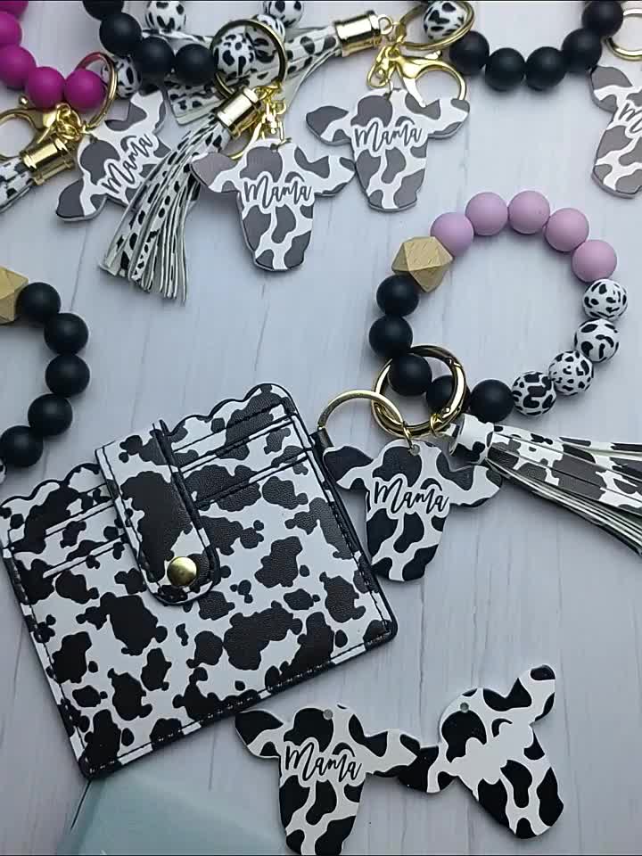 Wholesale Cow Print Leather tassel Cow head wood shavings Charm Tassel  keychain Retro geometric cow shape keyring wristlet From m.