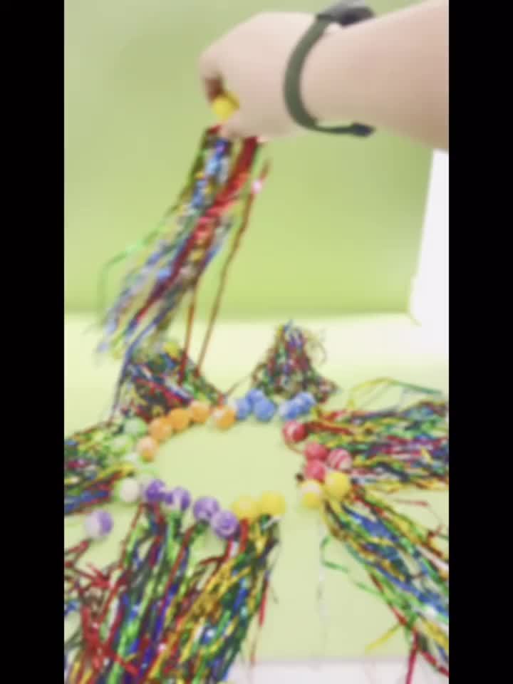 Colorful Elastic Balls with Gold Ribbons for Parent Interaction