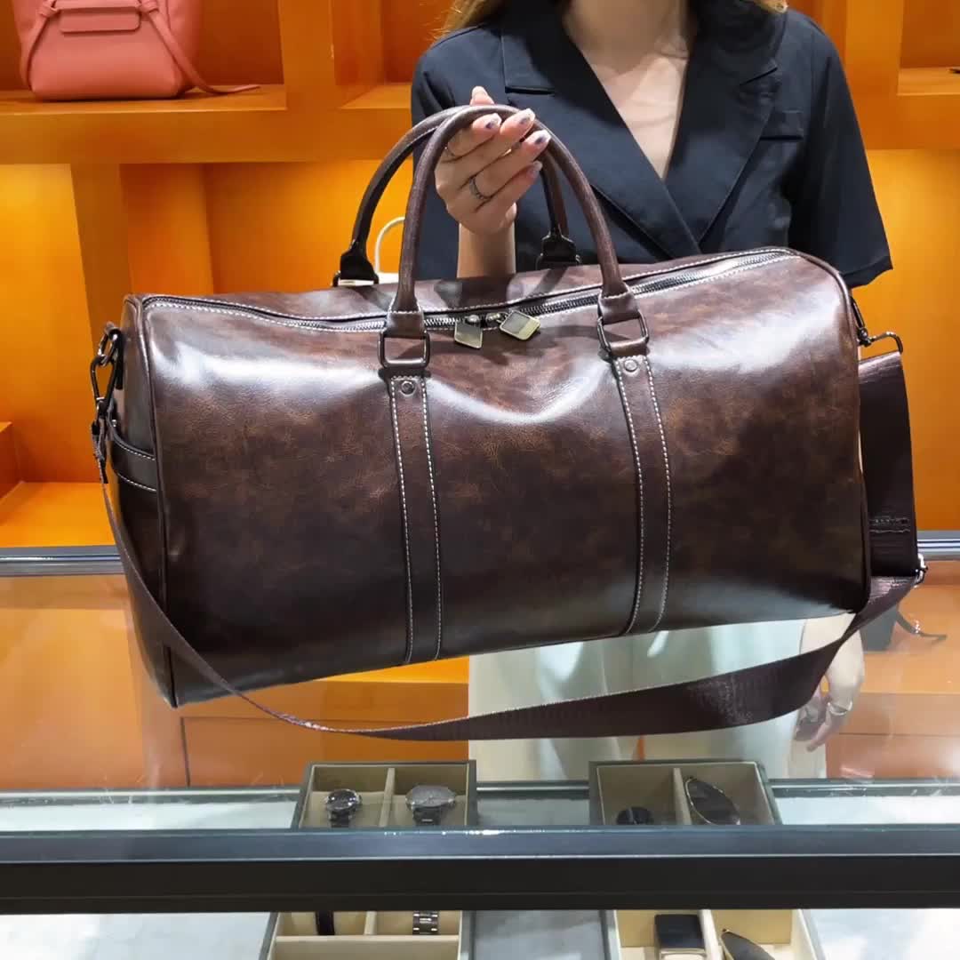 Vixen Large Black Leather Duffle Bag for the Modern Traveller