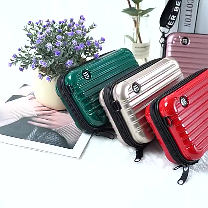 mini suitcase sling bag