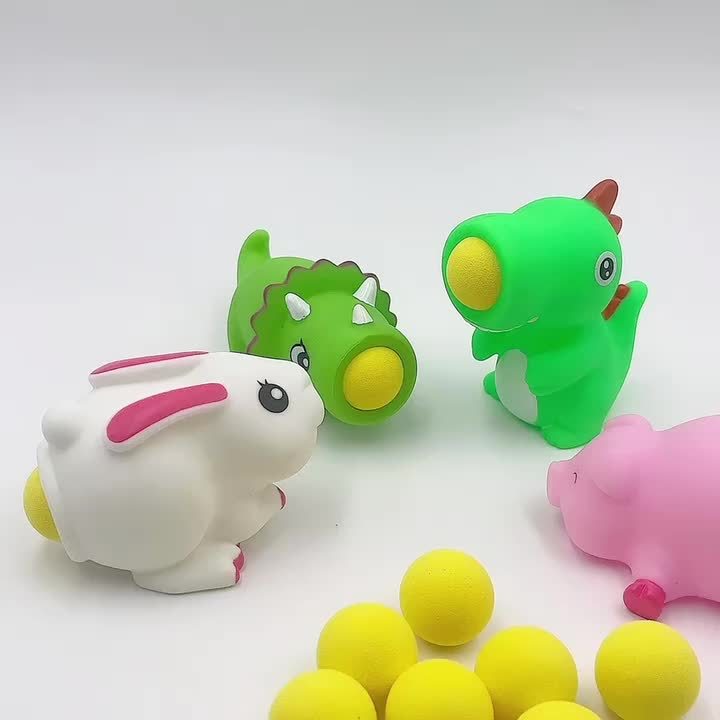 Toys that store pop out balls