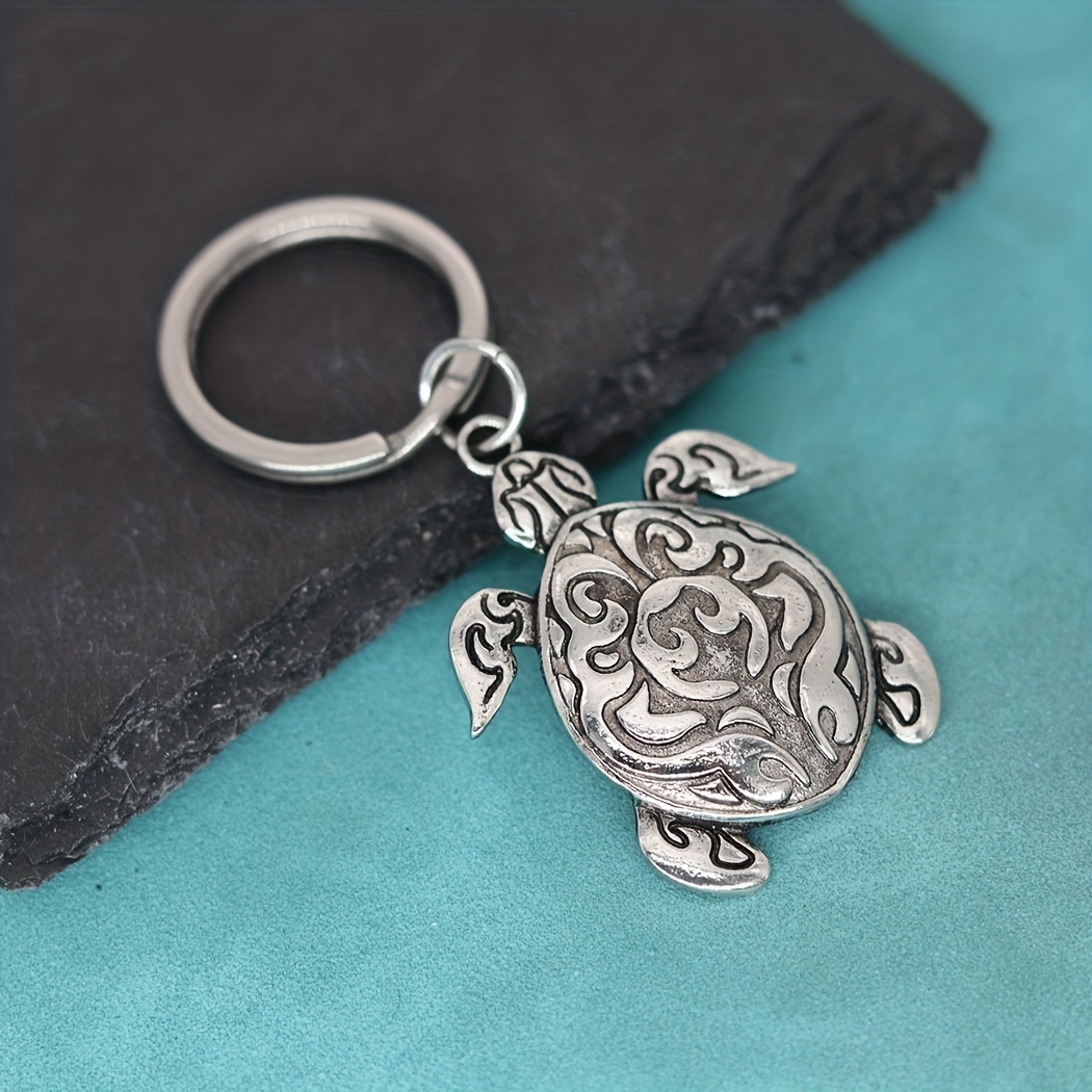 Porte-clés, bijou de sac motif tortue en acier argenté. : : Mode