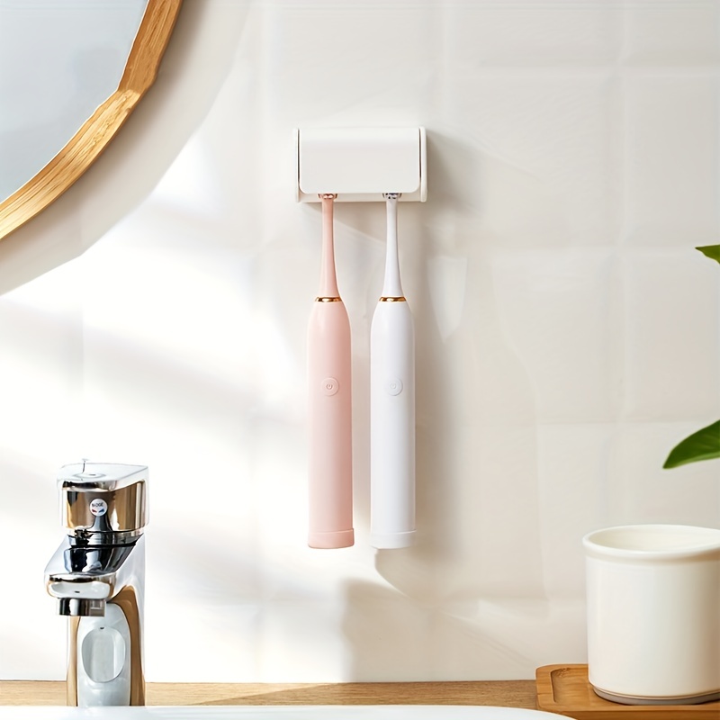 Soporte para cepillo de dientes eléctrico, organizador creativo sin rastro,  sin perforación, montado en la pared, accesorios de baño - AliExpress