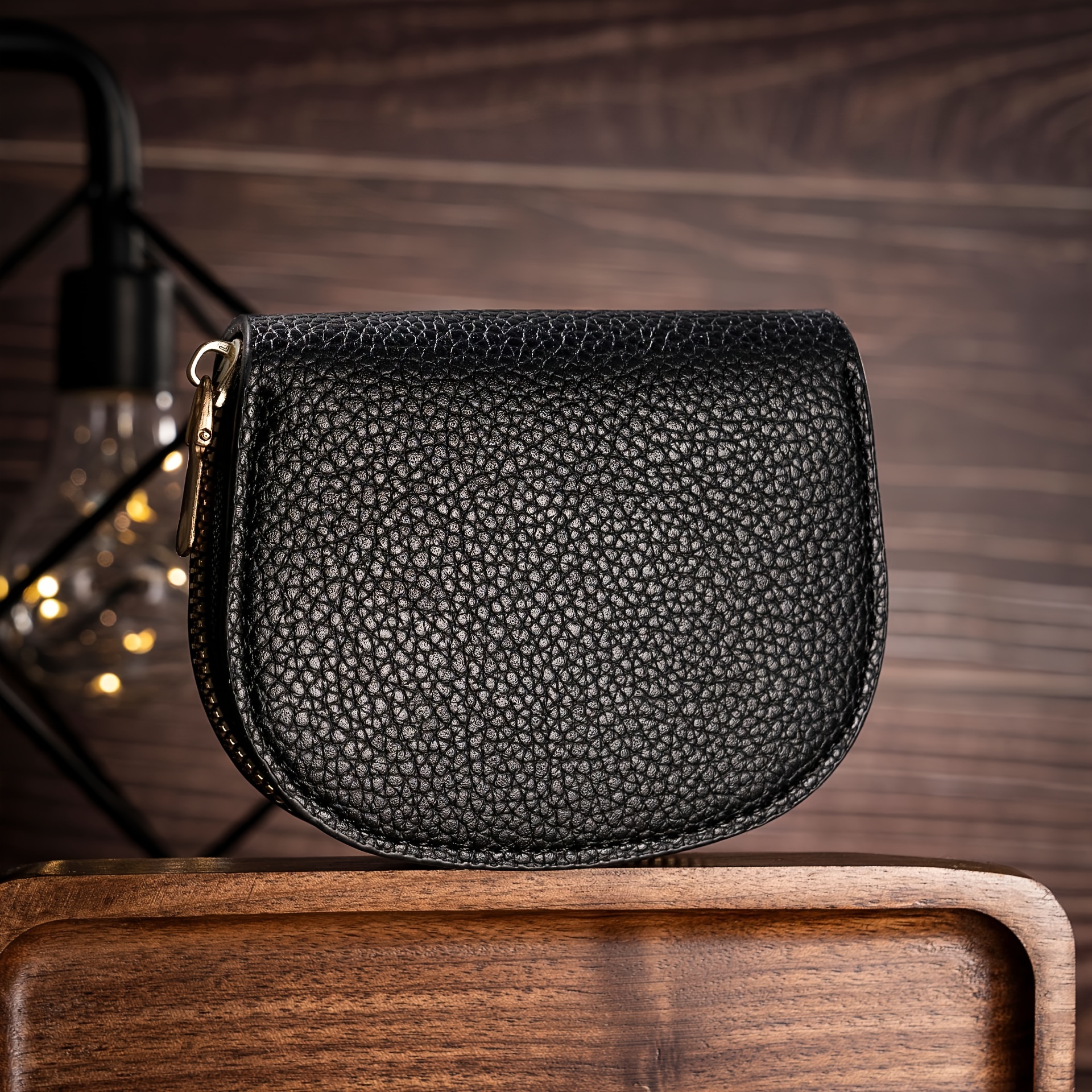 Black leather curved coin purse