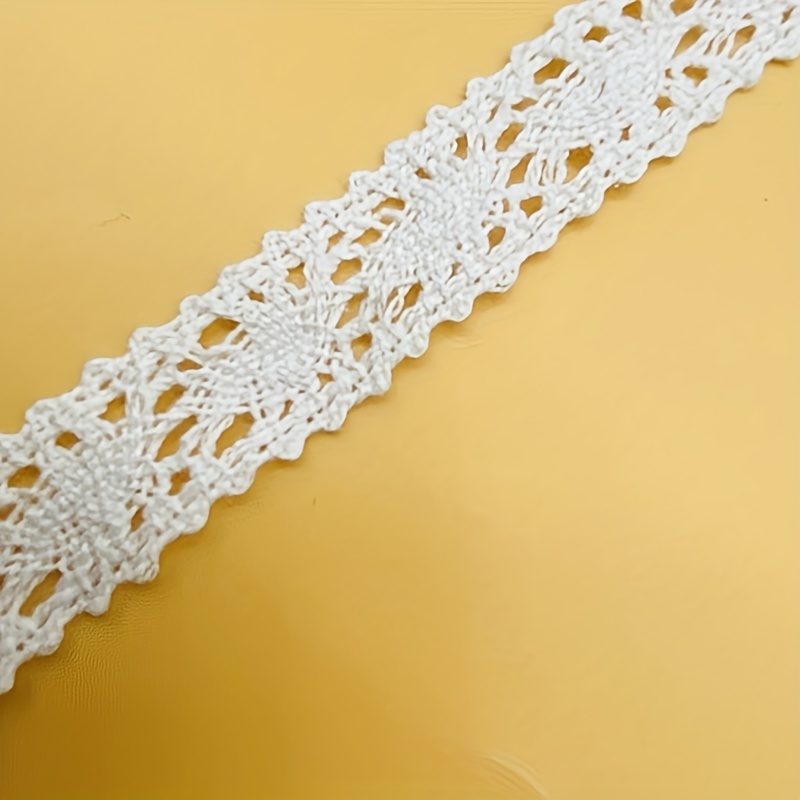 white straight strip of lace fabric. Texture for web