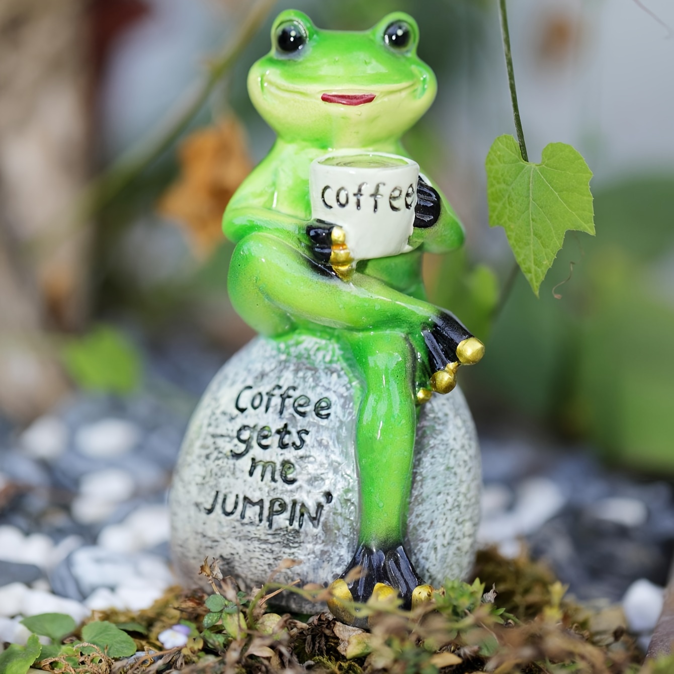 Image of A Decorative Piece Featuring A Frog Drinking Coffee.