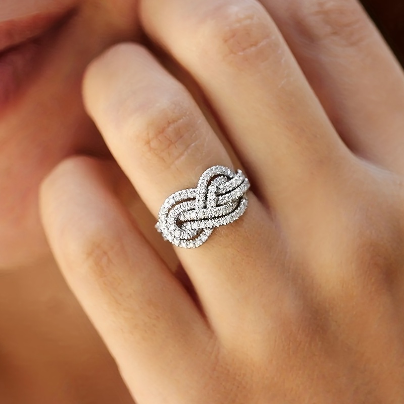 

Exquisite Ring Silver Plated Inlaid Shining Zircons Bow Knot Shape Symbol Of Eternity And Love Engagement Wedding Jewelry For Female