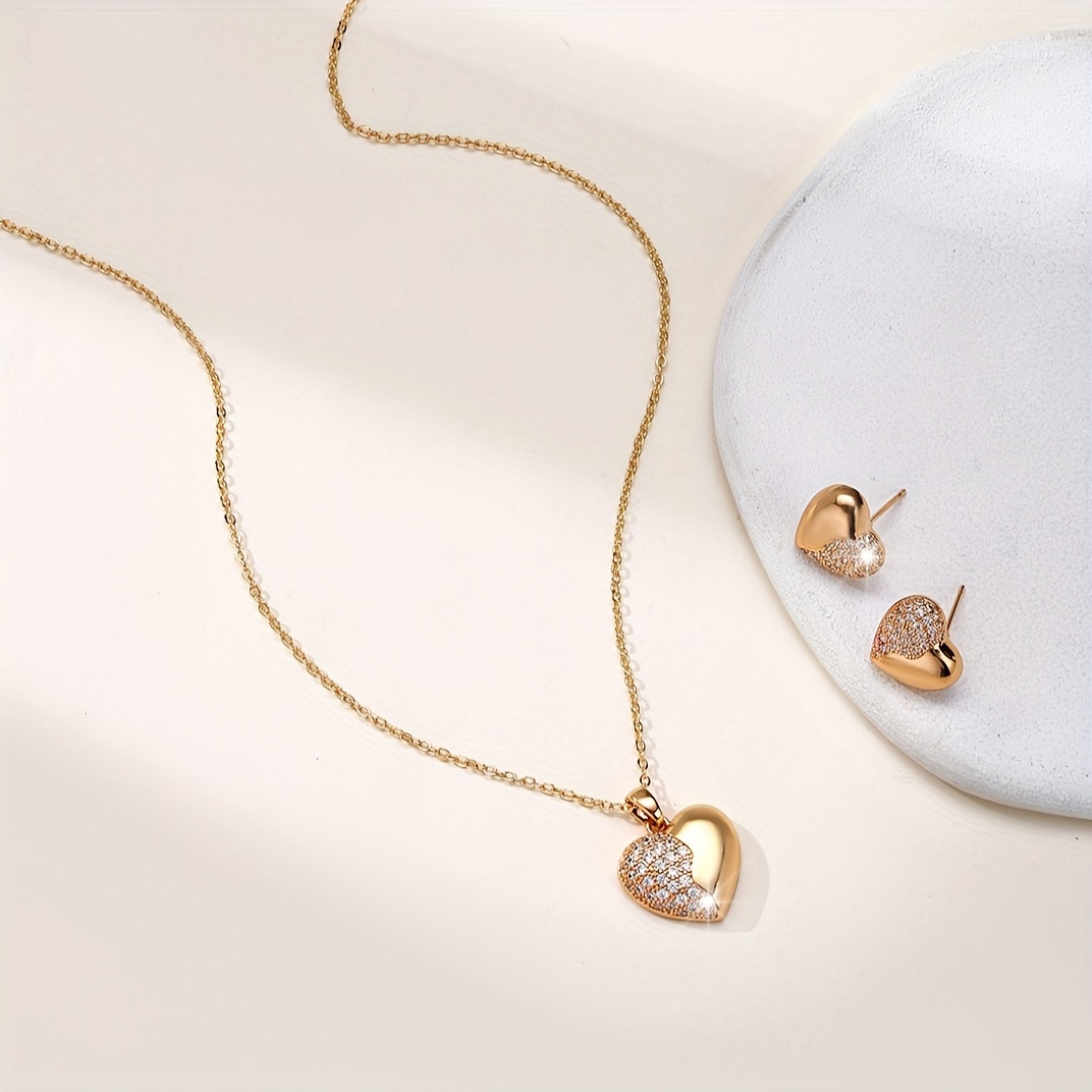 a set of womens wedding jewelry a valentines day gift featuring a heart shaped pendant earring   side made of full synthetic zirconia and   polished for a stylish look details 1