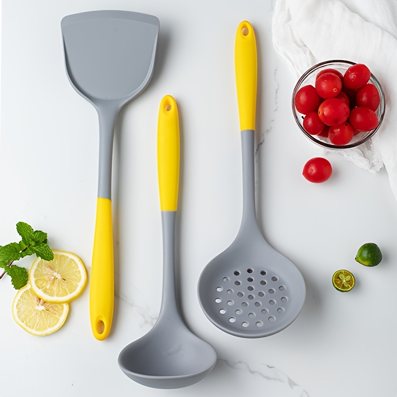 Kitchen utensils, home kitchen tools, mint rubber accessories on dark  background. Restaurant, cooking, culinary, kitchen theme. Silicone spatulas  and brushes Stock Photo by ©Magryt_Artur 441739308