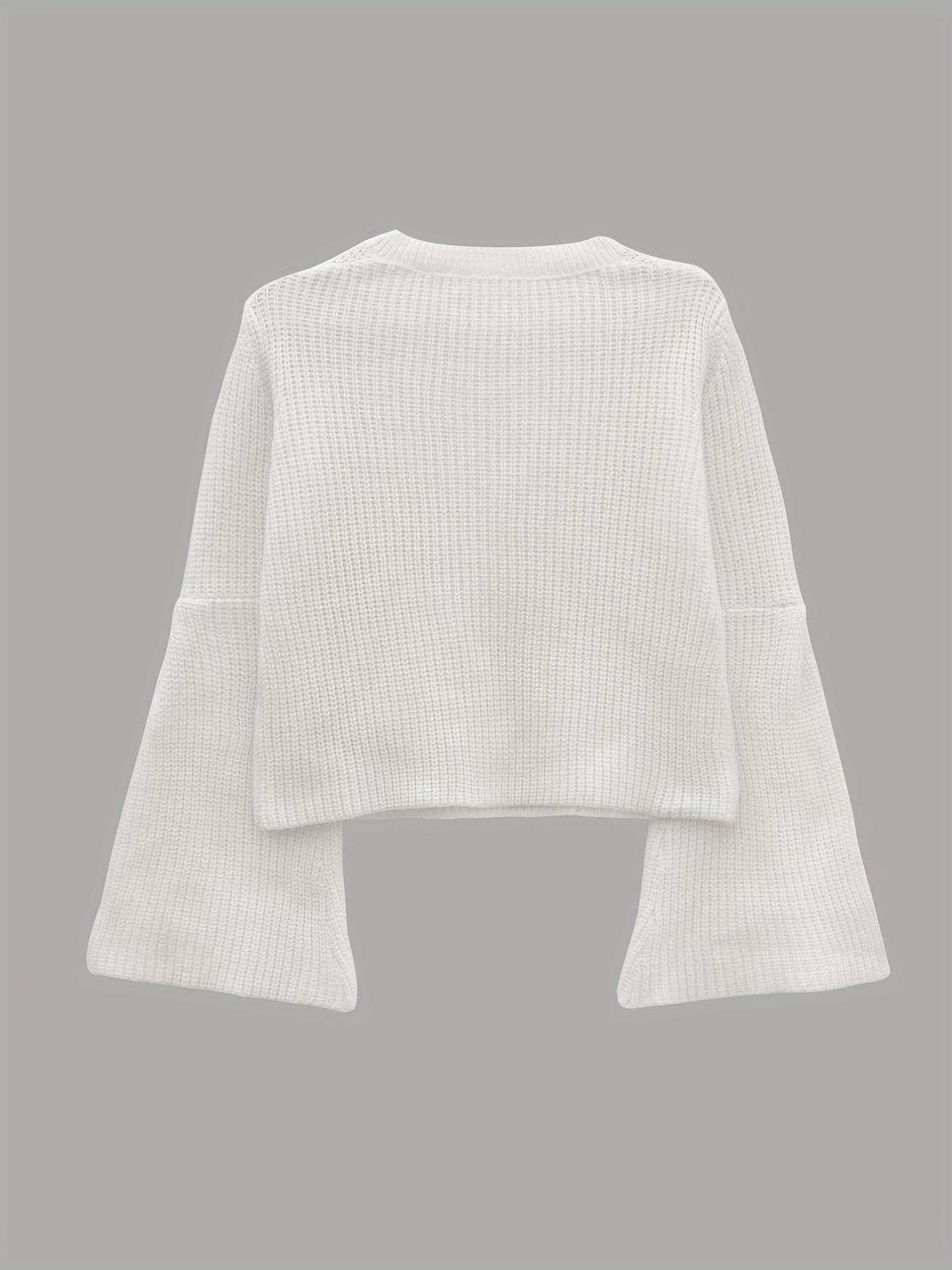 Flare arm outlet sweater